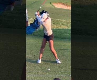 Golfers golfing