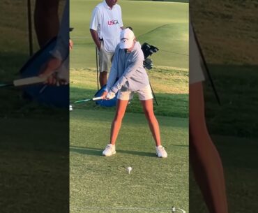Golfers golfing