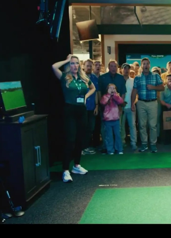 Adam Sandler and Paige Spiranac in a scene from the Happy Gilmore 2 trailer.