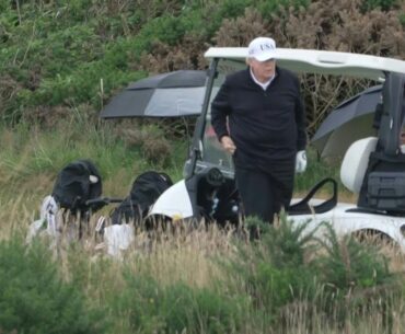 US President Donald Trump plays golf at his Turnberry resort in Scotland | AFP