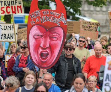 Hundreds protest Trump’s visit to Scotland as US president hits golf course