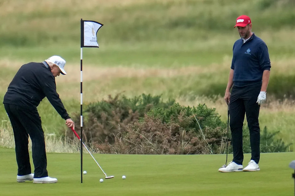 President Donald Trump puts a golf ball at Trump Turnberry golf course during his visit to the UK
