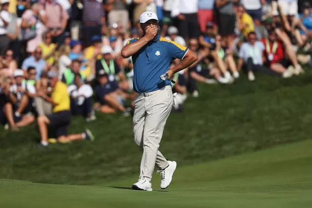 Jon Rahm reacts on the green