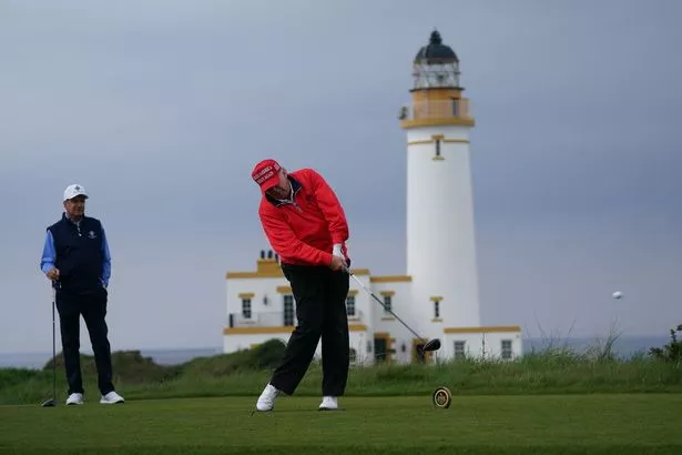 US president Donald Trump playing golf at  his Trump Turnberry course in South Ayrshire during his visit to the UK