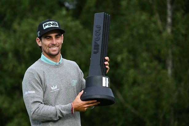 Joaquin Niemann poses with the LIV Golf UK title         