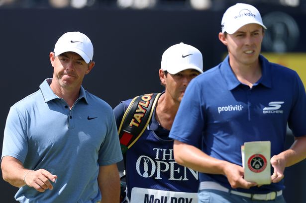 Rory McIlroy of Northern Ireland & Matt Fitzpatrick of England walks down the 1st hole on day four of The 153rd Open Championship at Royal Portrush Golf Club on July 20, 2025