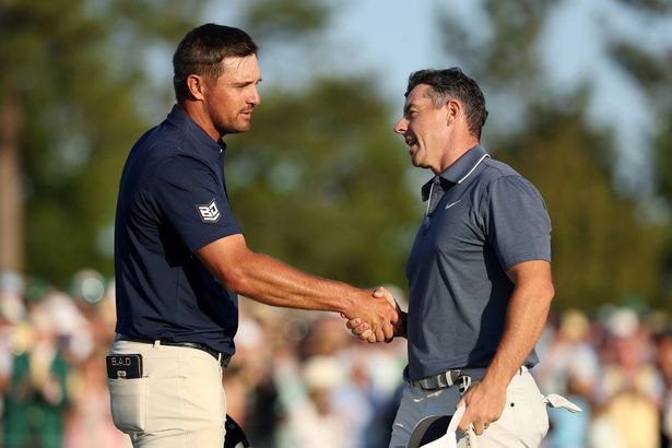 Bryson DeChambeau shakes Rory McIlroy's hand