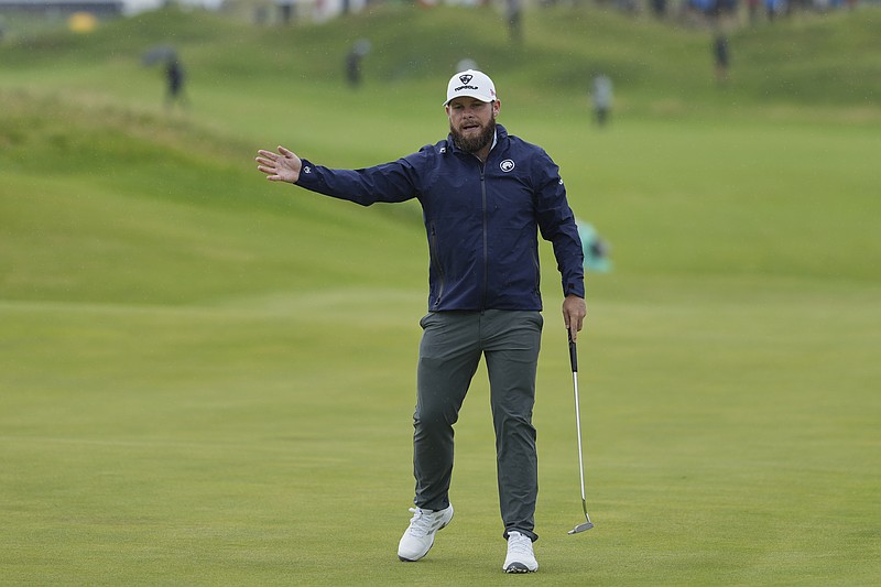 Tyrrell Hatton of England gestures after putting on the 10th green during the first round of the British Open golf championship at the Royal Portrush Golf Club, Northern Ireland, Thursday, July 17, 2025. (AP Photo/Jon Super)