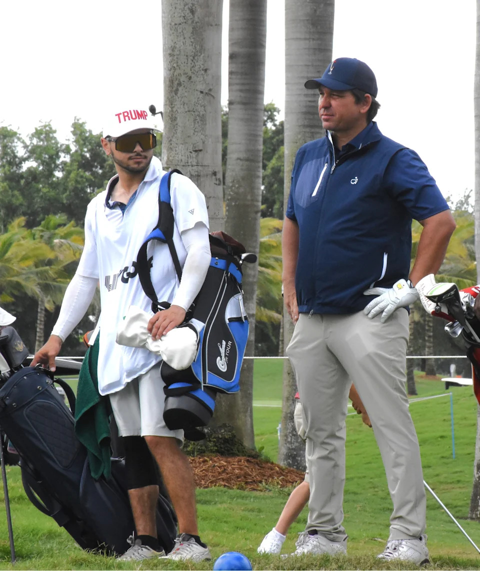 Florida governor Ron DeSantis watches members of his LIV Golf team tee off during Thursday's Pro-Am event on April 3, 2025.