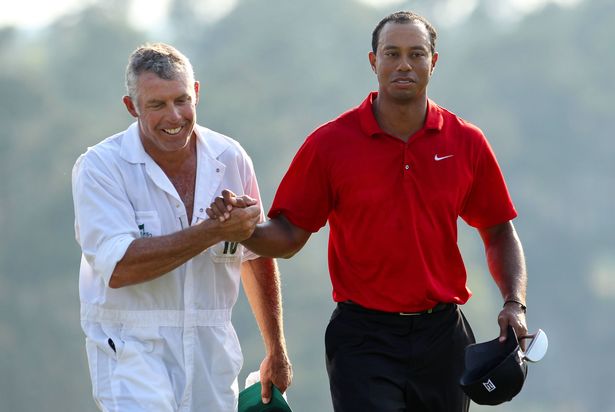 Steve Williams and Tiger Woods shaking hands