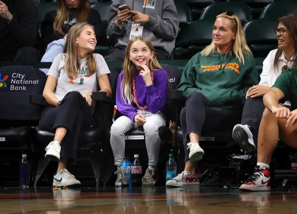 Kai Trump, granddaughter of President Donald Trump and incoming UM golfer (high school Class of ’26), left, attends the women’s basketball game with her family on Sunday, Jan. 26, 2025, at Watsco Center in Coral Gables, Fla.