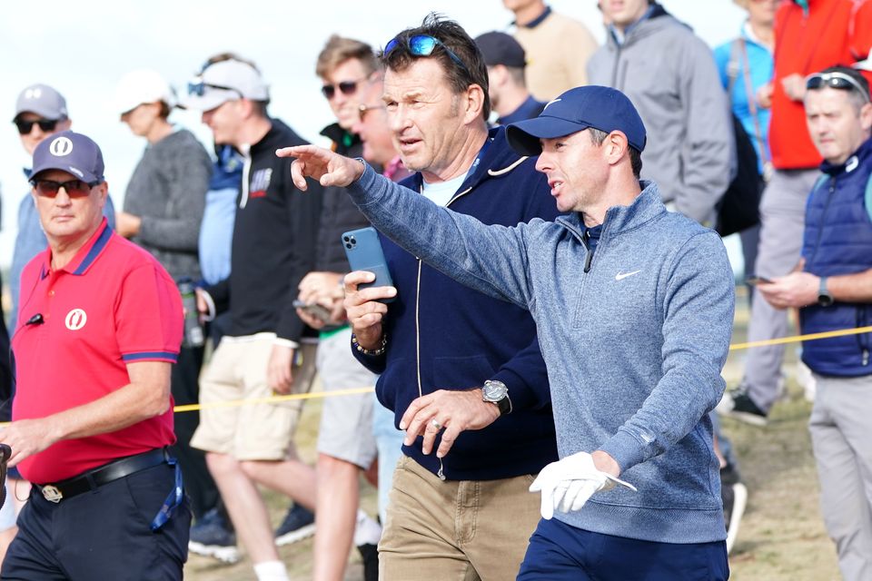 Nick Faldo in conversation with Rory McIlroy (Jane Barlow/PA)