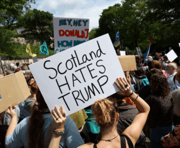 Trump plays golf in Scotland as protesters rally