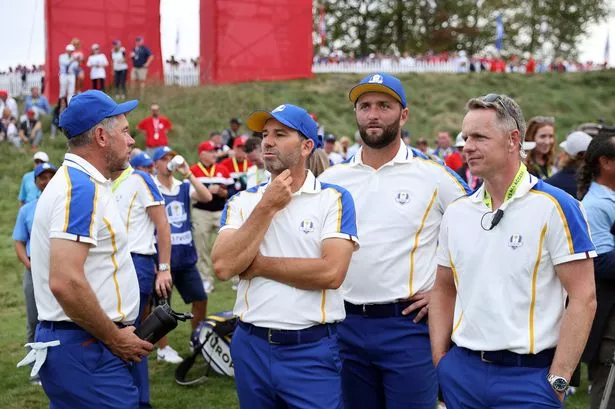 Lee Westwood of England and team Europe, Sergio Garcia of Spain and team Europe, Jon Rahm of Spain and team Europe, and vice-captain Luke Donald of England and team Europe watch during Sunday Singles Matches of the 43rd Ryder Cup at Whistling Straits on September 26, 2021 