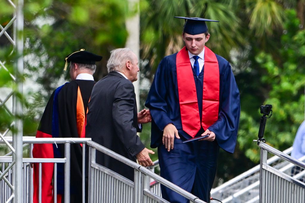 Barron Trump, son of former US President Donald Trump and former First Lady Melania Trump, takes part in his graduation at Oxbridge Academy