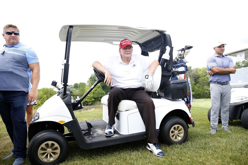 Former U.S. President Donald Trump waits on the ninth tee in his golf cart during the pro-am prior to the LIV Golf Invitational - Bedminster at Trump National Golf Club Bedminster on July 28, 2022 in Bedminster, New Jersey. (Photo by Jonathan Ferrey/LIV Go