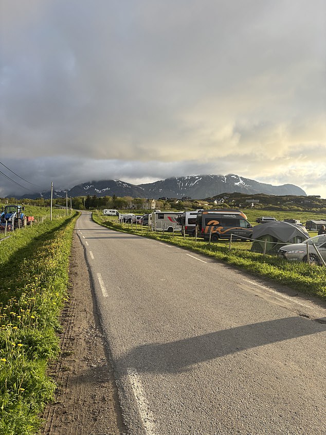 A solitary road that runs through Lofoten at the heart of a very small and quiet community