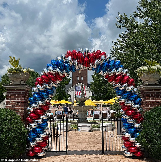 A red, white and blue balloon arch decorates Bedminster