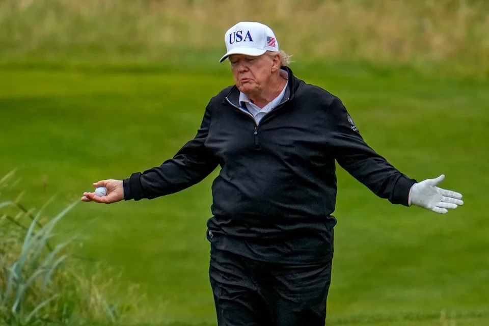 Social media users claim a clip shows Trump’s caddy move his ball during a round of golf in Scotland, the latest in a long string of allegations that the president cheats at golf (Getty Images)