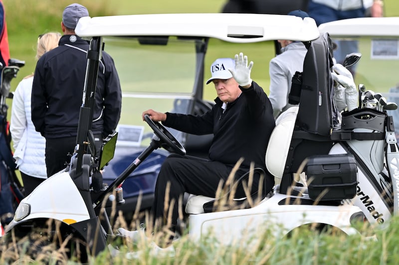 US president Donald Trump waves as he drives a golf buggy the Trump Turnberry golf courses, in Turnberry on the south west coast of Scotland on July 26th, 2025. Photograph: AFP via Getty Images