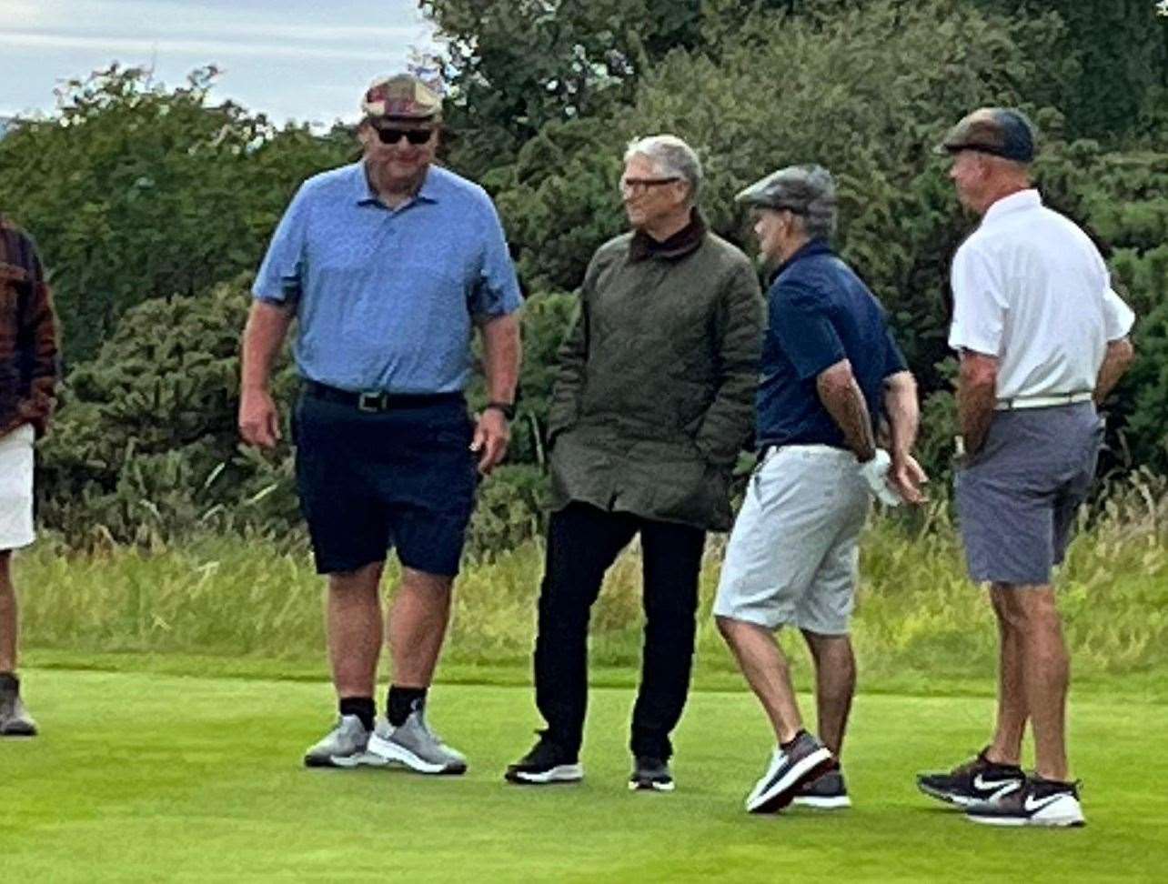 Bill Gates on the course greeting players at Royal Dornoch.