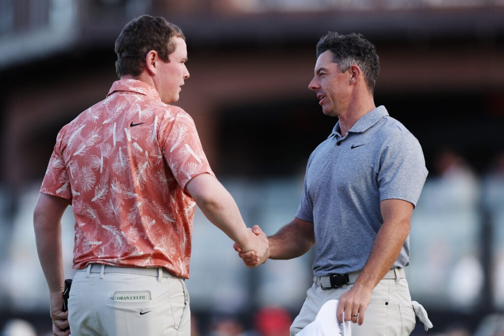 Rory McIlroy and Robert MacIntrye shake hands on the 18th green at the 2024 Scottish Open
