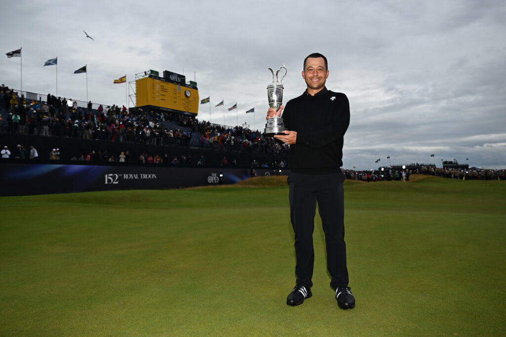 Xander Schauffele of the United States lifts the Claret Jug