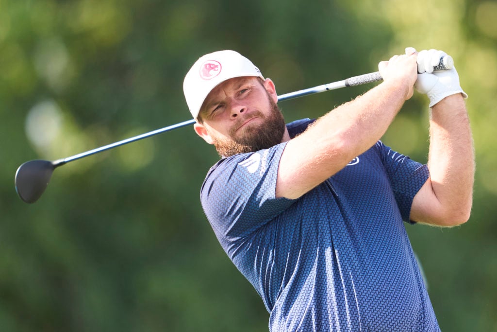 Tyrrell Hatton hits a tee shot during the final round of the Hero Dubai Desert Classic