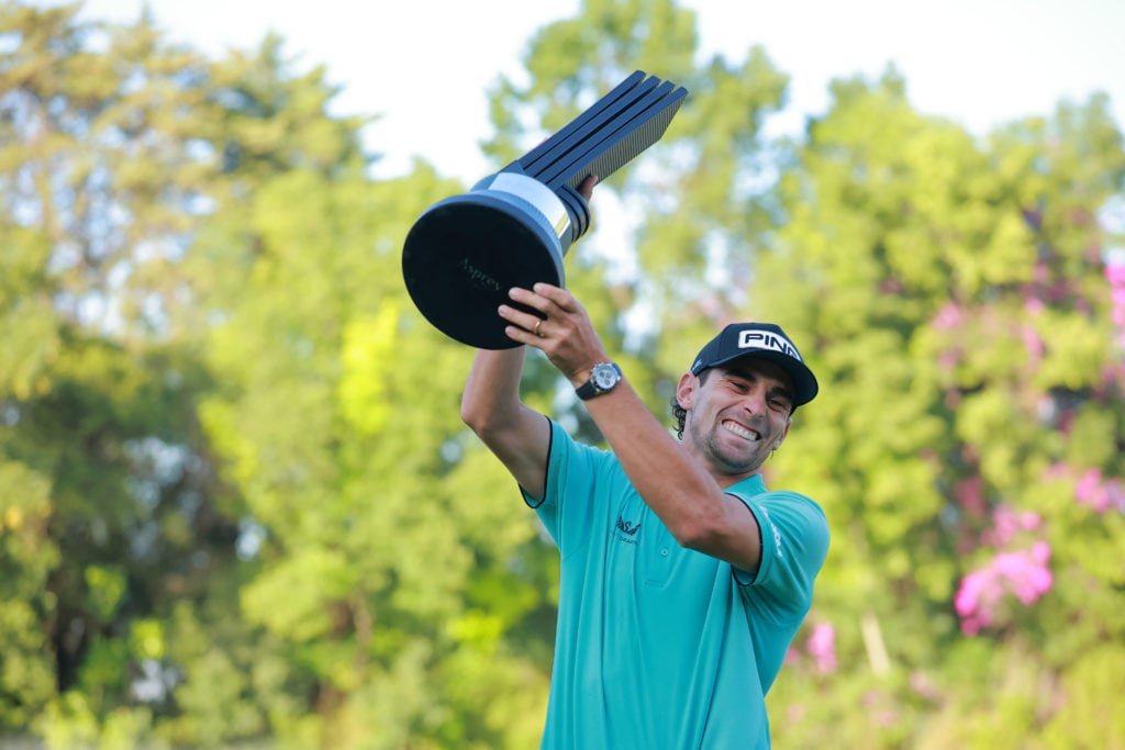 Joaquín Niemann lifts the trophy after winning LIV Golf Mexico City
