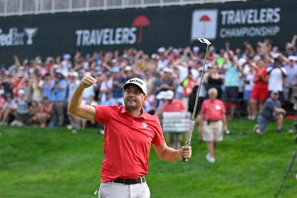 Keegan Bradley celebrates after winning the Travelers Championship