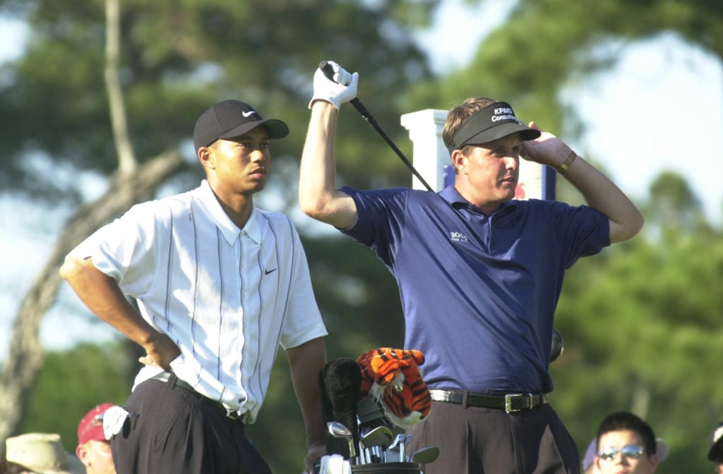 Tiger Woods and Phil Mickelson in action during The Players Championship in 2013