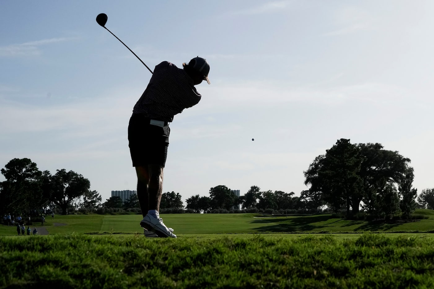 Charlie Woods hits from the seventh tee during the first round of the U.S. Junior Amateur...