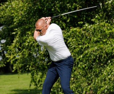 Mark Pope swinging a golf club - Tommy Quarles, UK Athletics