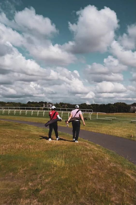 Amy Yang and her caddie, Jan Meierling, tee it up at Musselburgh Links ahead of the Women's Scottish Open.