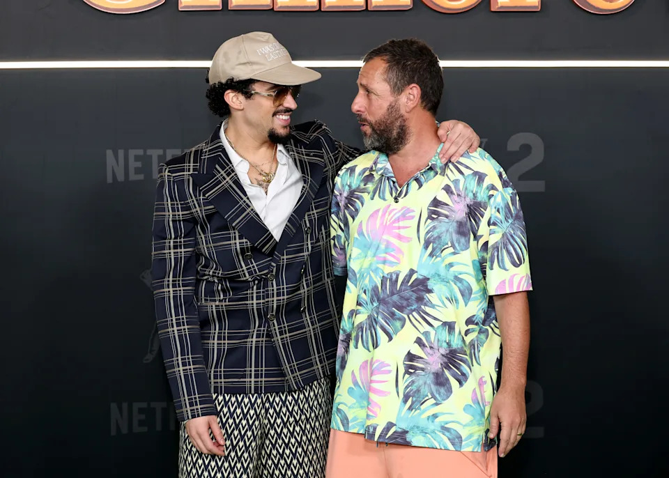 (L-R) Bad Bunny and Adam Sandler attend Netflix's "Happy Gilmore 2" New York Premiere.