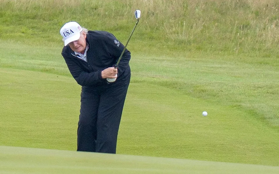 Donald Trump playing golf