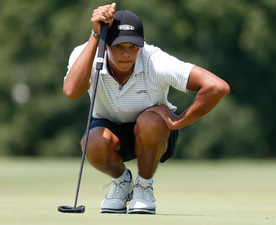 Charlie Woods lines up a putt Tuesday, July 29, 2025, during the Junior PGA Championship at the Purdue Birck Boilermaker Golf Complex in West Lafayette, Indiana.