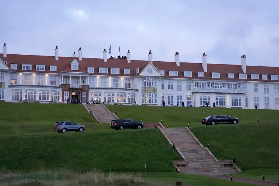 The motorcade with President Donald Trump arrives at the golf course in Turnberry, Scotland (AP)