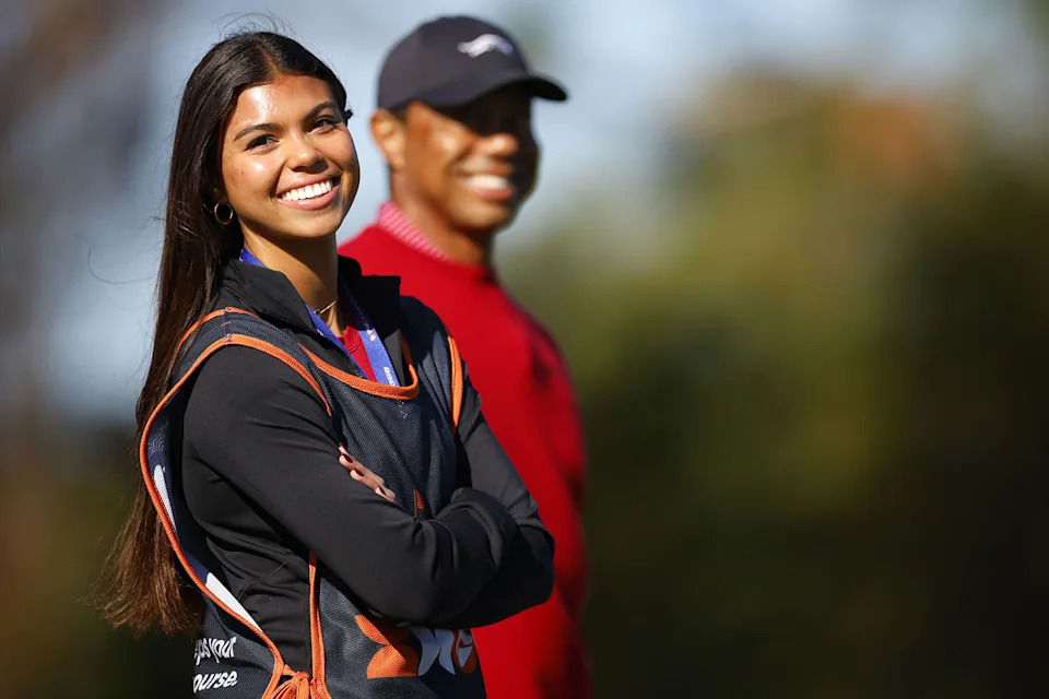 ORLANDO, FLORIDA - DECEMBER 22: Sam Woods and her father Tiger Woods of the United States stand in the first tee during the second round of the PNC Championship at Ritz-Carlton Golf Club on December 22, 2024 in Orlando, Florida. (Photo by Mike Ehrmann/Getty Images)