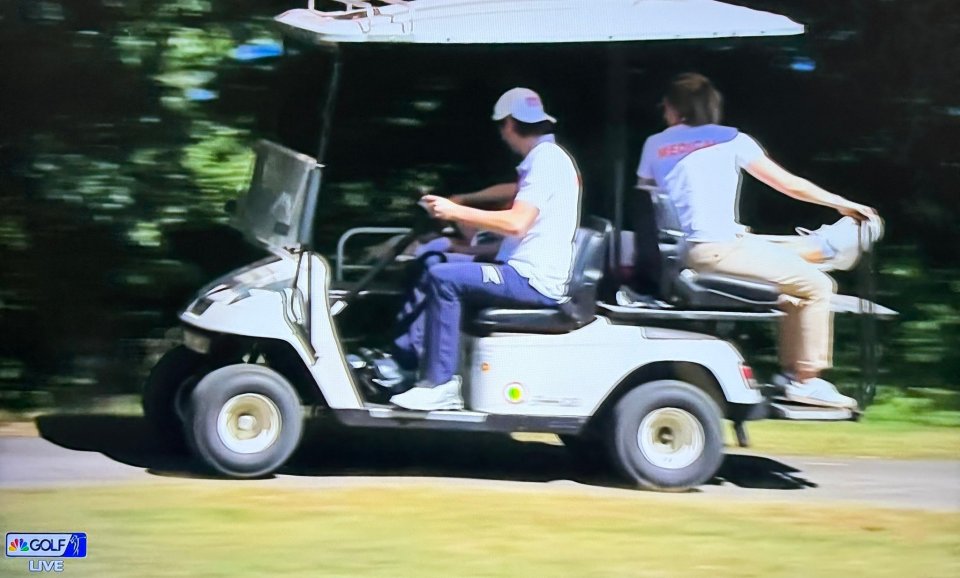 Charley Hull being carried off in a golf cart after collapsing twice during a tournament.