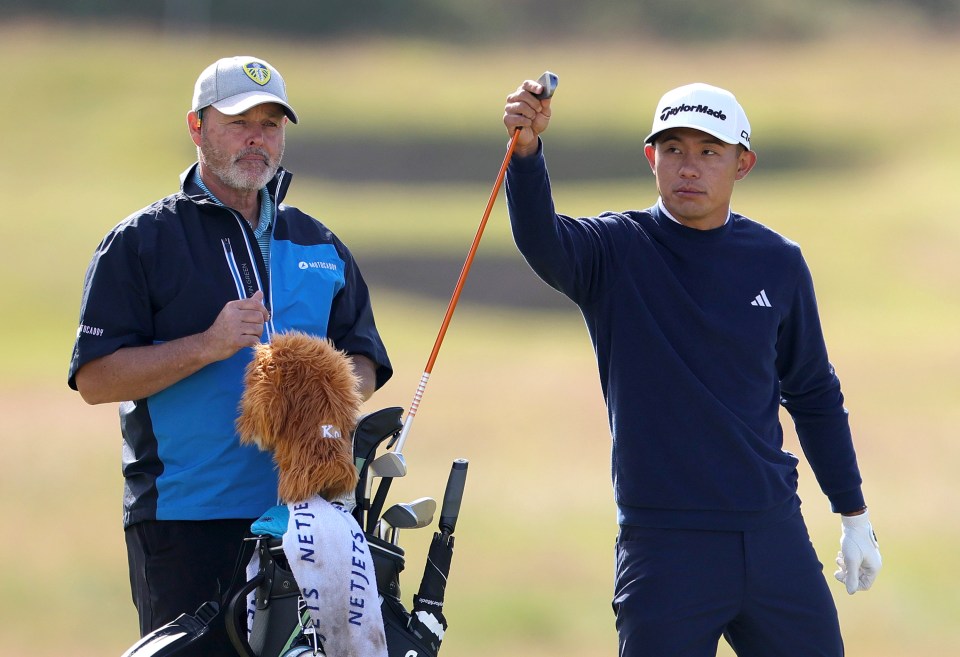 Foster is carrying the bag Morikawa at The Open