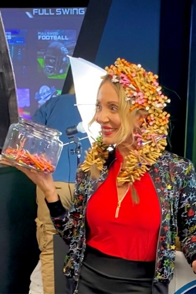 Anya with her hair full of golf tees