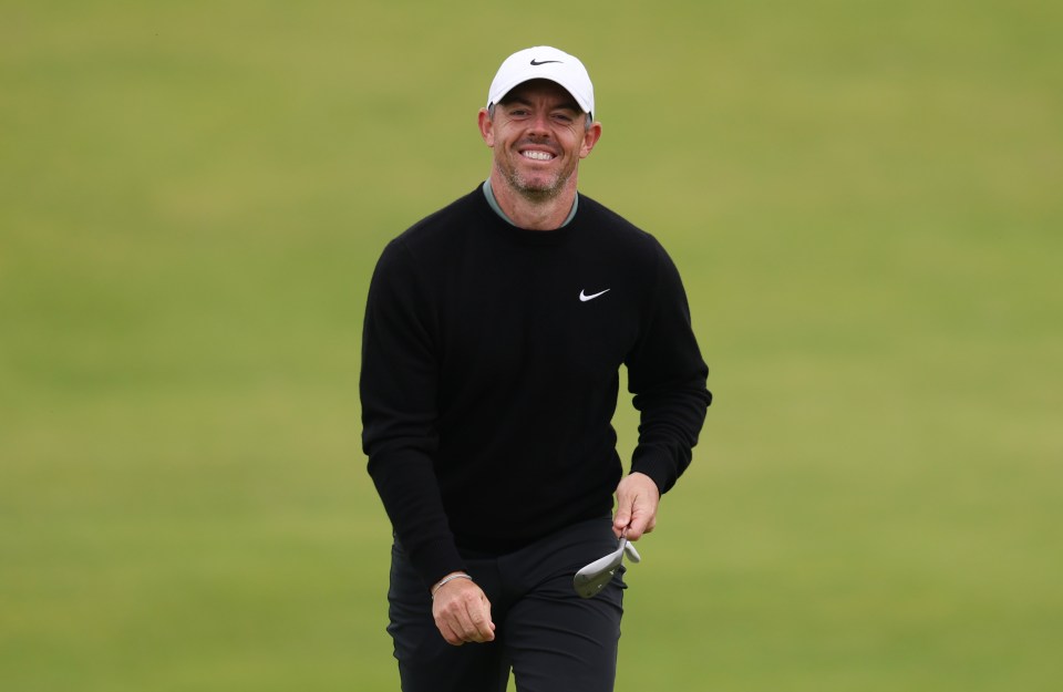 Rory McIlroy smiling during a practice round.