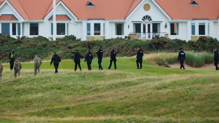 Security personnel check the Trump Turnberry resort golf course, during U.S. President Donald Trump's visit to Scotland, in Turnberry, Scotl