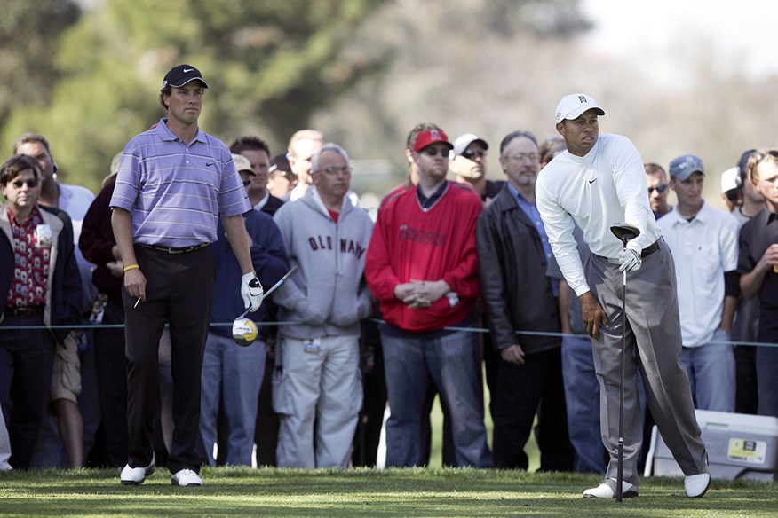 Tiger Woods handed out a monumental beating to Stephen Ames after being criticised by him.