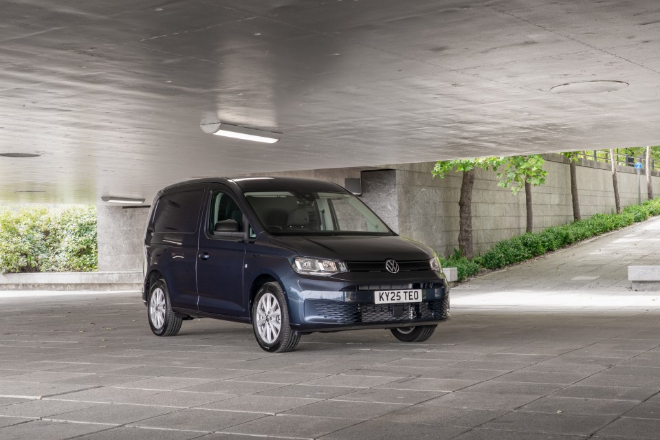 VW Caddy van parked in a garage.