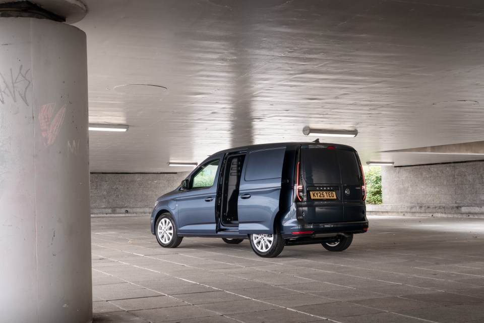 VW Caddy van parked in a garage.