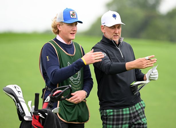 Ian Poulter of England with his caddie and son Luke Poulter at the 9th hole during Day Two of the JP McManus Pro-Am at Adare