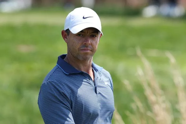 Rory McIlroy of Northern Ireland walks from the fourth tee during the final round of the Truist Championship 2025 at The Wissahickon at Philadelphia Cricket Club on May 11, 2025 in Flourtown, Pennsylvania.