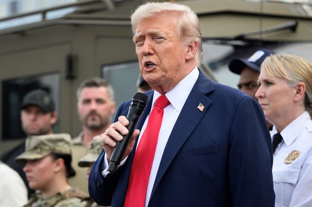 US President Donald Trump speaks while visiting federal troops at the US Park Police Anacostia operations facility in Washington, DC, on August 21, 2025. Trump said he plans to patrol Washington's streets on Thursday with troops he deployed to the US capital in a show of force against what he claims is a "crime emergency." Trump ordered hundreds of National Guard to deploy in Washington last week vowing to "take our capital back," despite protests by some residents and statistics showing violent offenses falling
